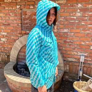Blue tile snow jacket. Light weight great insulation. Hood fits over a helmet!